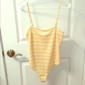 Privacy please yellow bodysuit